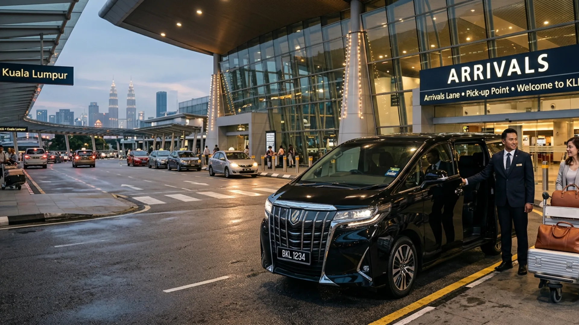 A driver waiting at the arrivals barrier of an airport terminal at night as passengers come through with their luggage